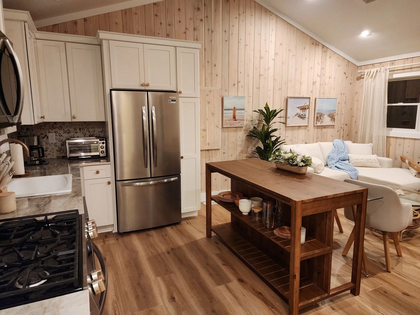 Kitchen island at Cottage 4 with open shelving for dishes and glassware