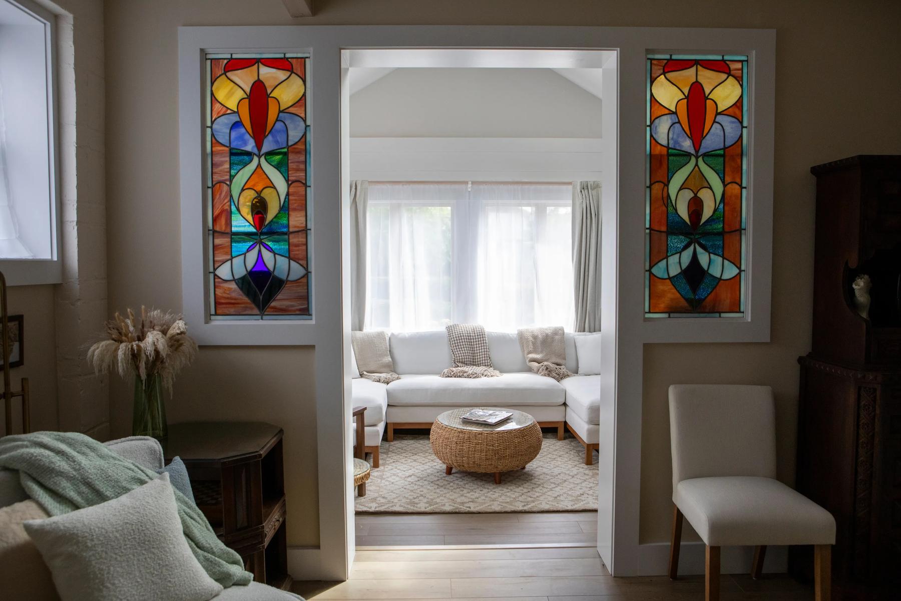 Handmade stained glass flanking the entrance to the sunroom at Casa di Rottino