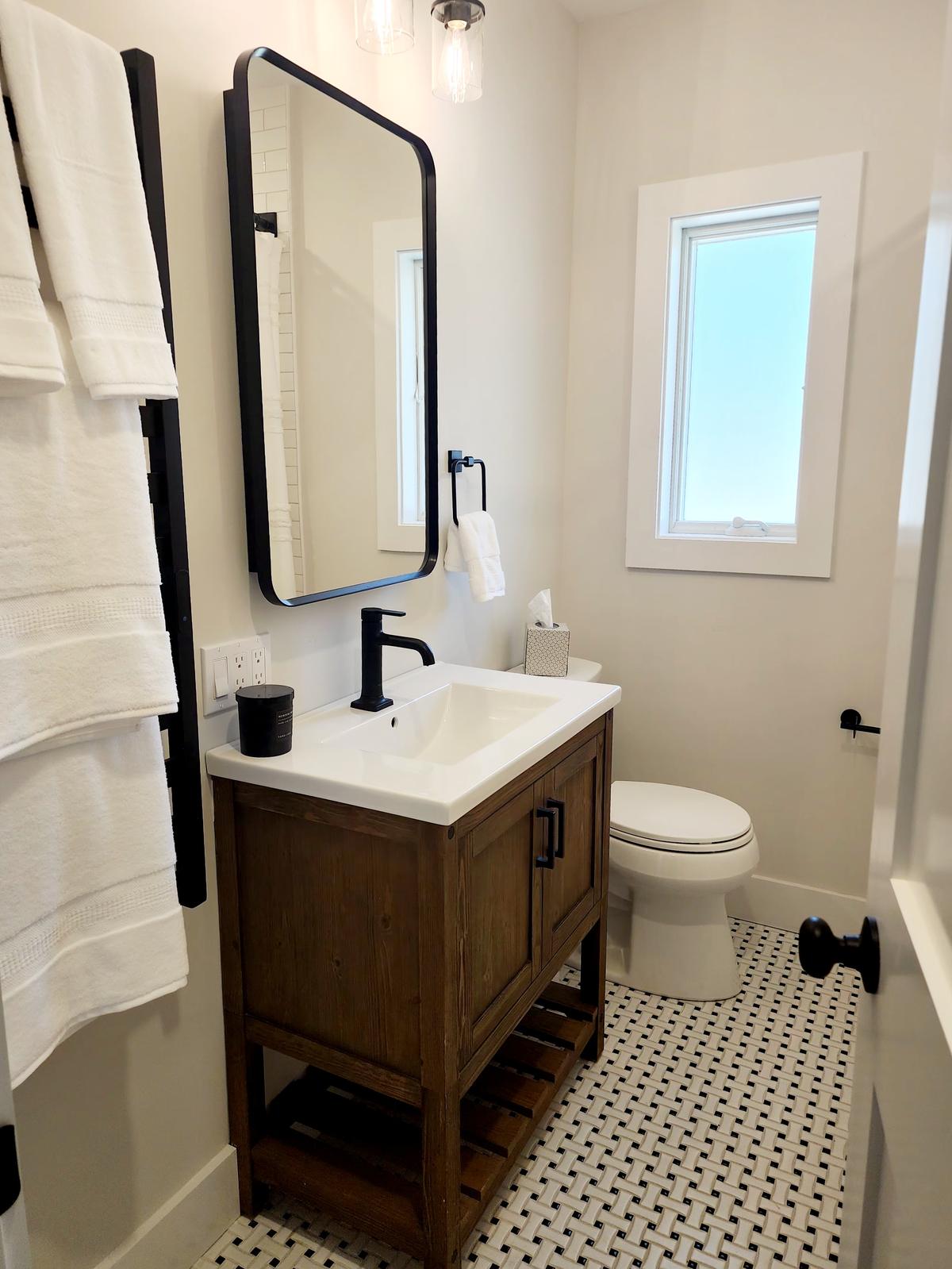 Full bathroom with European-style basketweave tile floor