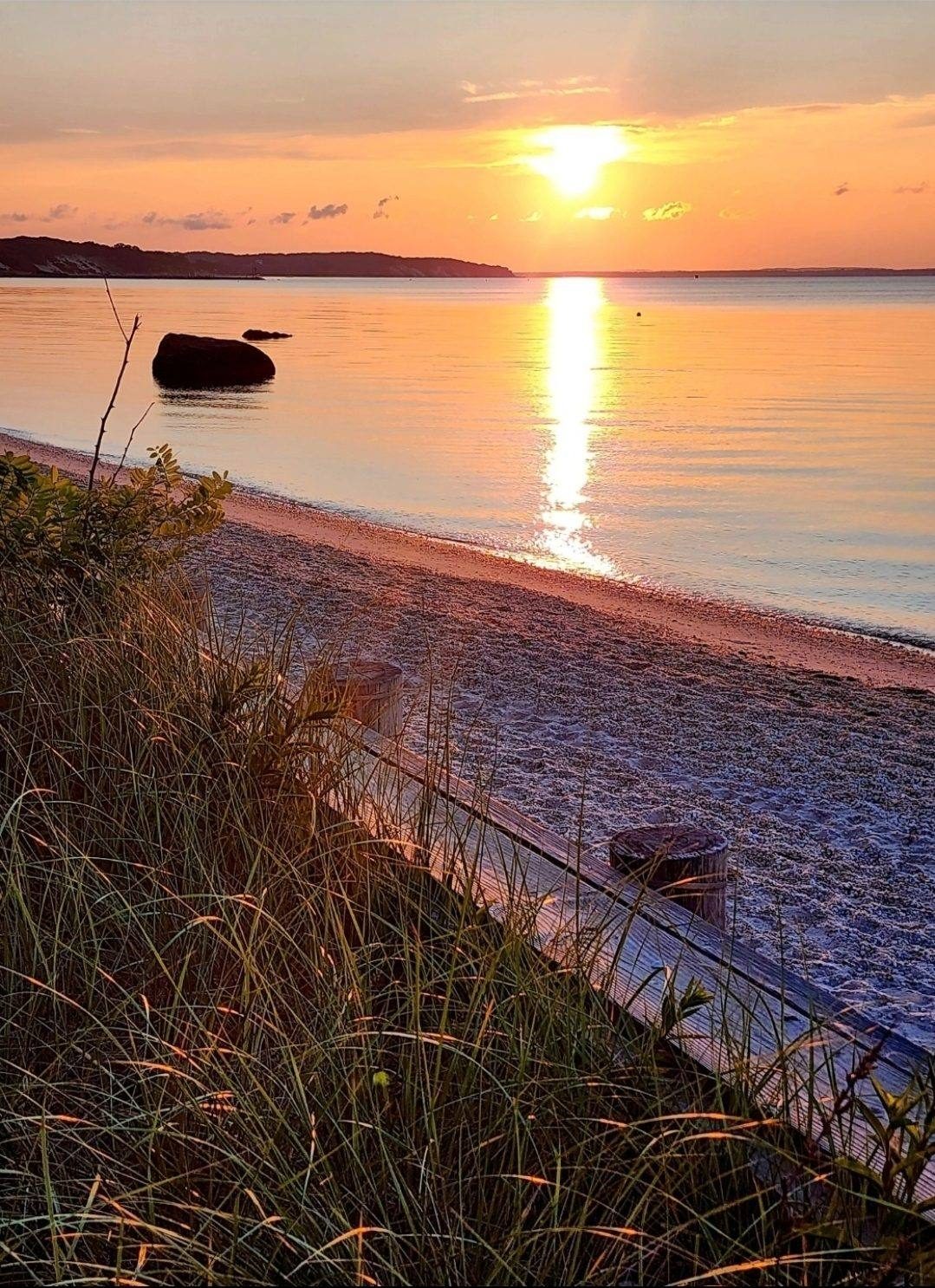 Sunset over Peconic Bay from the shoreline