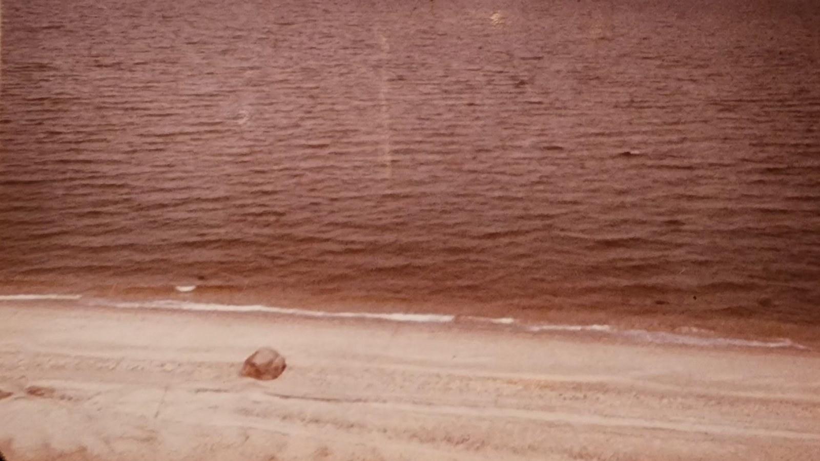 The large rock at the shoreline of Peconic View Cottages, a longstanding gathering spot on the beach