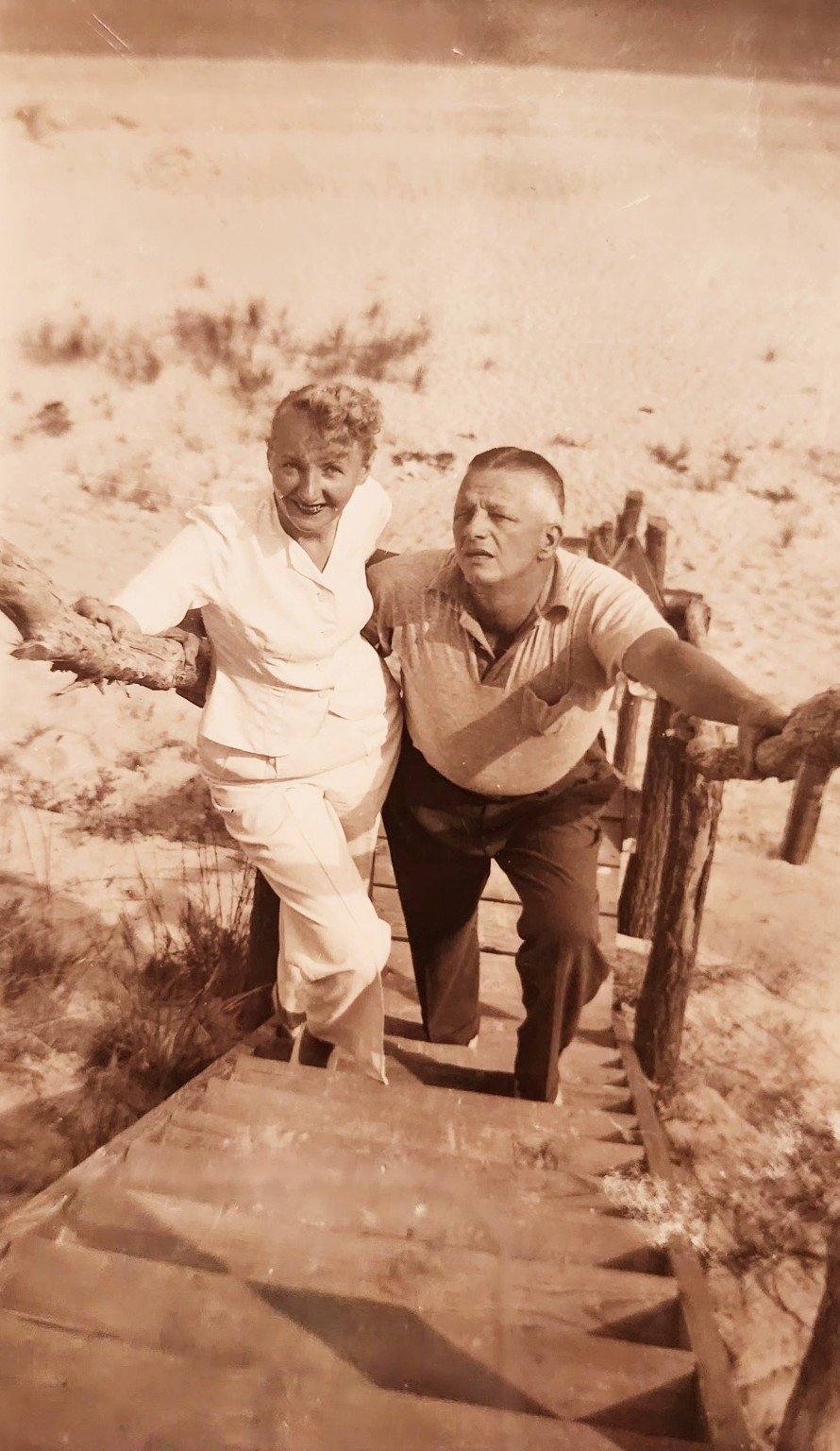 Some of the original guests at the base of the bluff by the old wooden stairs, vintage photograph