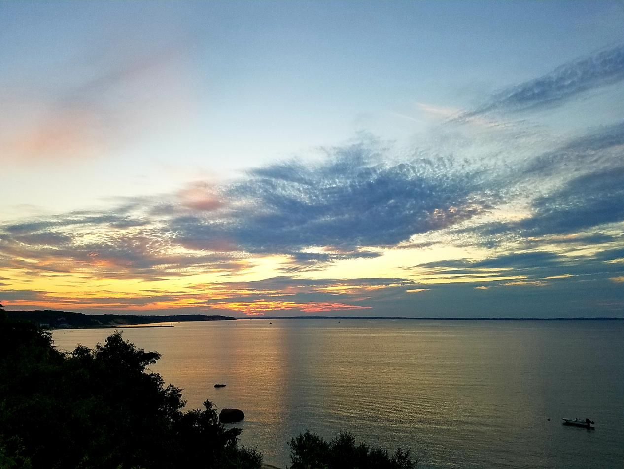 Soft clouds over the bay at first light