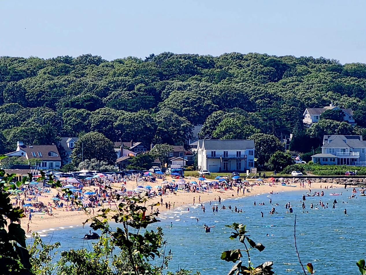 Meschutt Beach crowded with people on a summer day